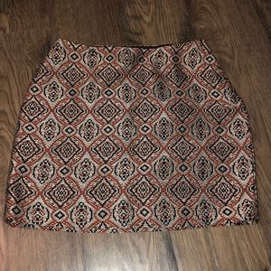 Tan, orange & black printed h&m skirt